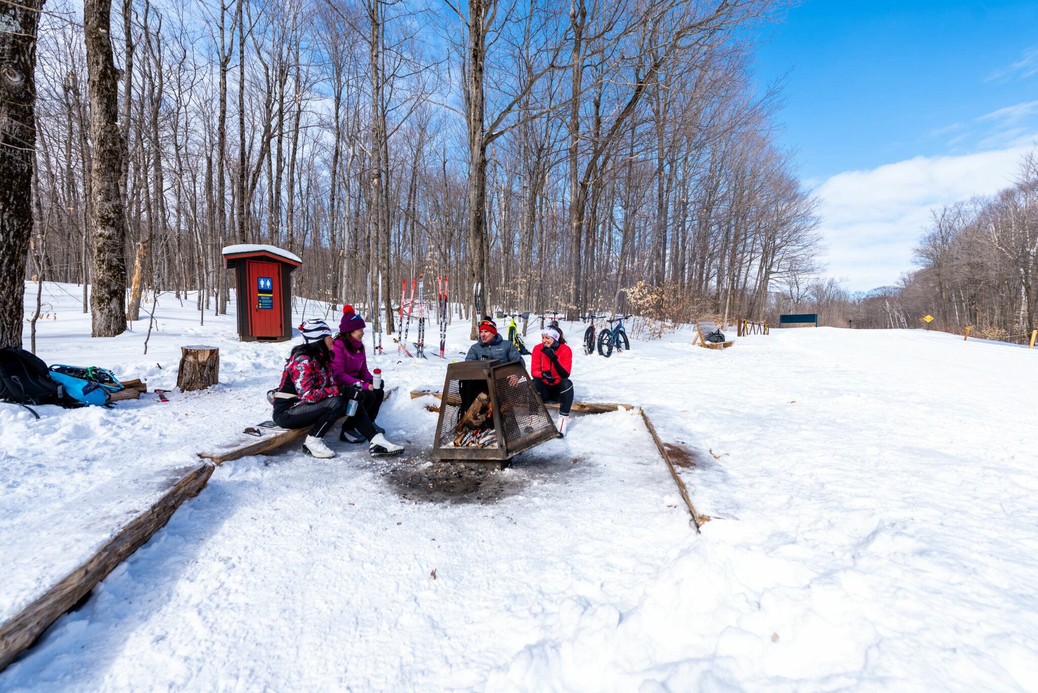 People at firepit rest area